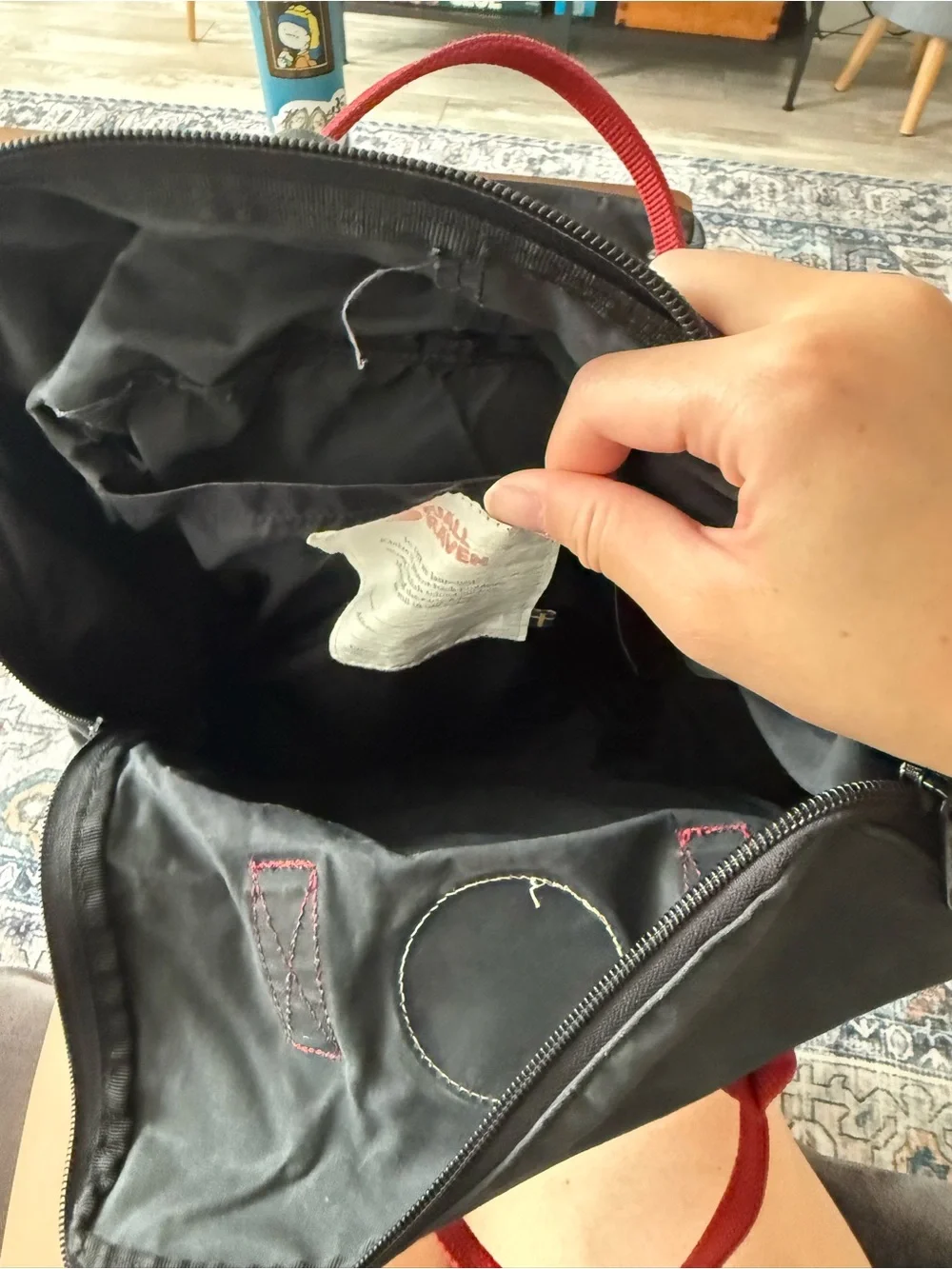 Fjallraven Kånken Backpack in Black with Red Handles